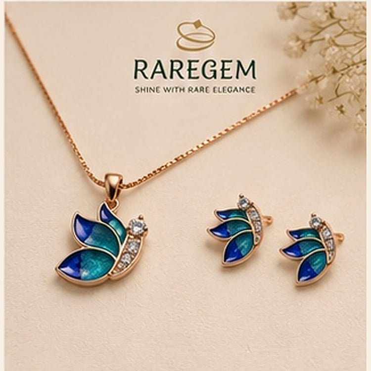 Blue enamel butterfly pendant, chain and matching stud earrings