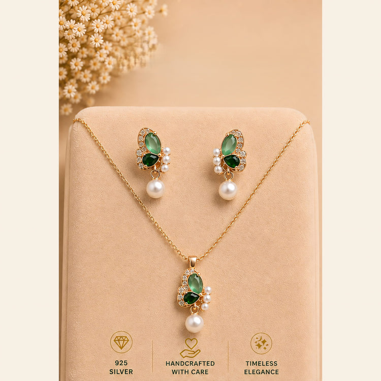 Green butterfly-inspired pendant and matching pearl drop earrings