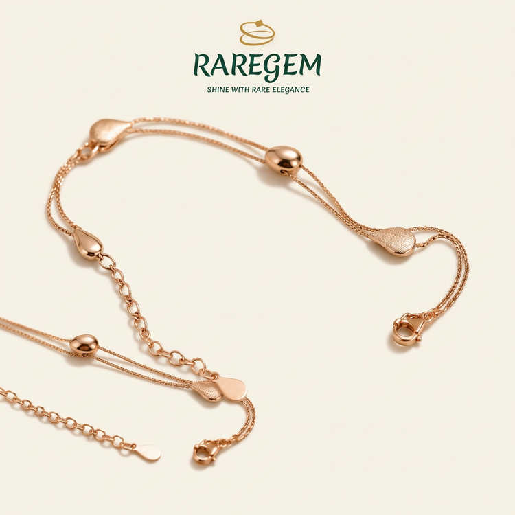 RG-029 Teardrop Double Chain Bracelet on warm ivory with RAREGEM logo