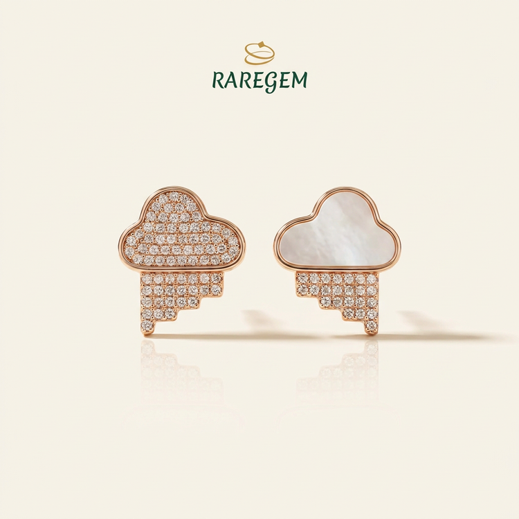 RG-025 cloud earrings showing pavé and mother-of-pearl faces on warm ivory with RAREGEM logo