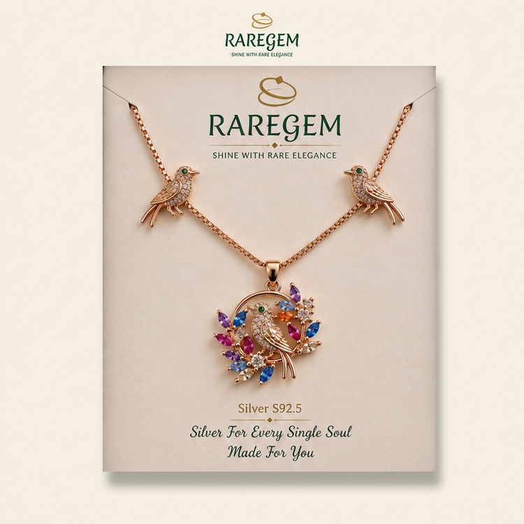 RG-017 Bird CZ Necklace and Earring Set on warm ivory with RAREGEM logo